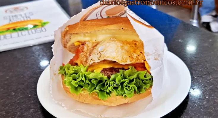Hambúrguer do Seu Oswaldo, Lanchonete tradicional no Ipiranga, Hambúrguer raiz São Paulo, Onde comer hambúrguer no Ipiranga, Clássicos da gastronomia paulistana, Melhor hambúrguer simples SP, Hambúrguer com molho de tomate, Lanchonetes antigas em São Paulo, Gastronomia de bairro, Hambúrgueres old school, Hambúrguer raiz, Seu Oswaldo, Ipiranga, São Paulo, Lanchonete tradicional, Comida afetiva, Diários Gastronômicos, Gastronomia paulistana